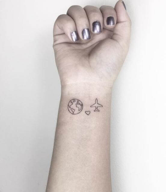 Minimalist plane and world map tattoo