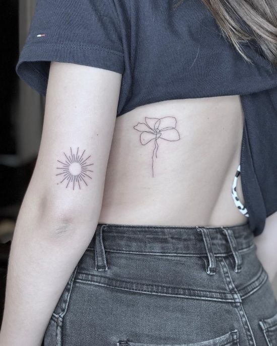 Minimalist sun and flower tattoo designs