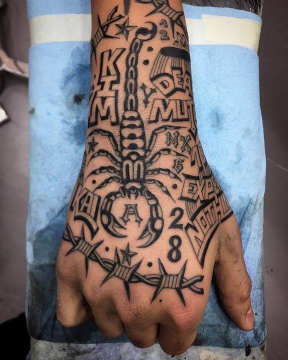 Scorpion Hand Tattoo designs