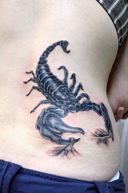 Scorpion tattoos on girl's rib