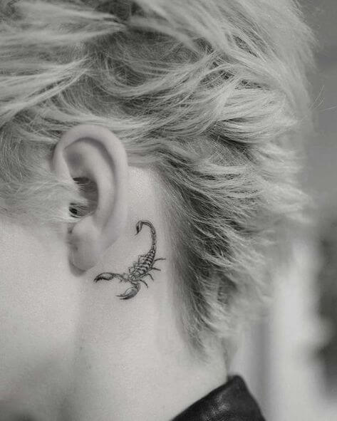 Small Scorpion tattoo designs behind the ear