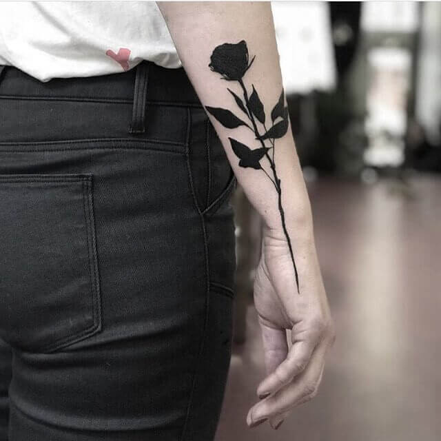 Solid Black Rose tatto on arm