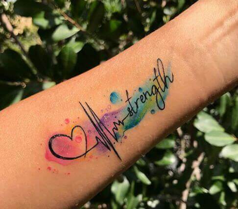 Colorful Strength Tattoos on arm