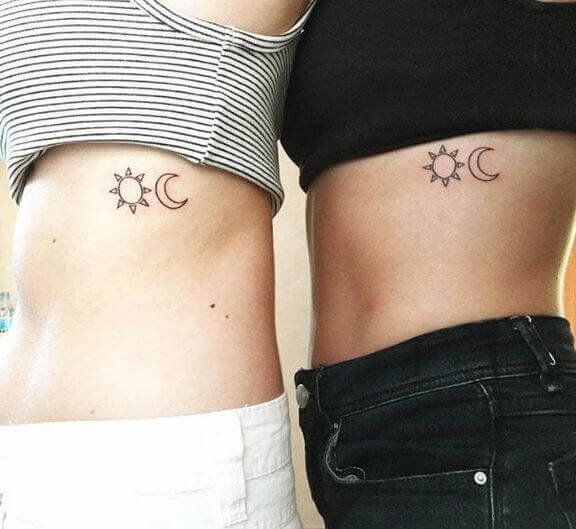 Sun and Moon Tattoo on ribs