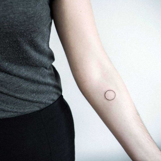 Small Circle tattoo on arm for girls