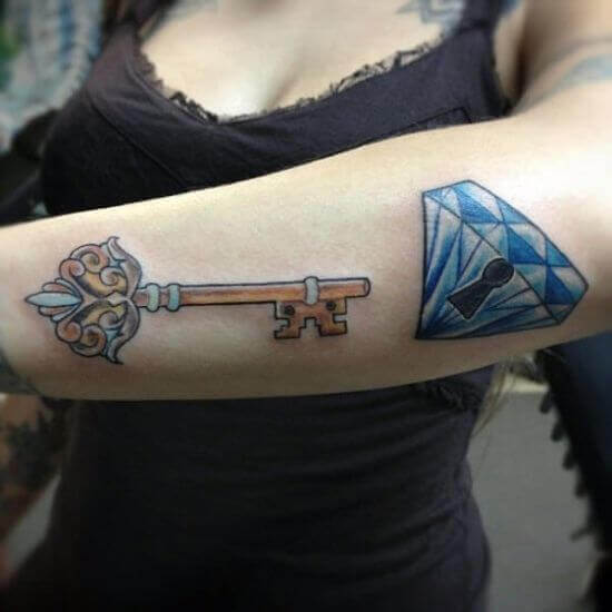 Diamond with Lock and Key Tattoo on Girl Arm