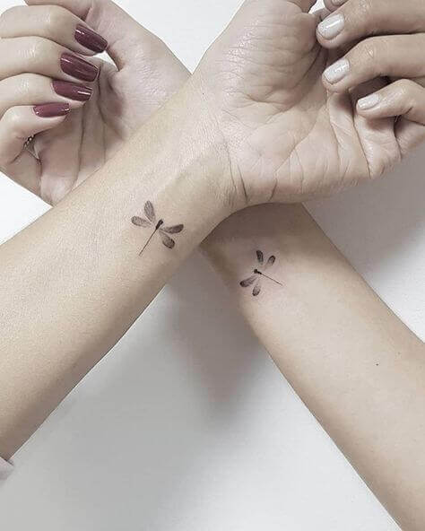 Matching small tattoos