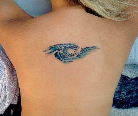 Ocean tattoo on girl's back