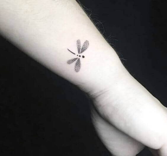 Tiny dragonfly tattoo designs on wrist