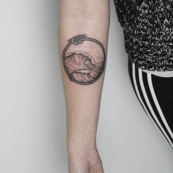 Unique wave tattoo designs on arm