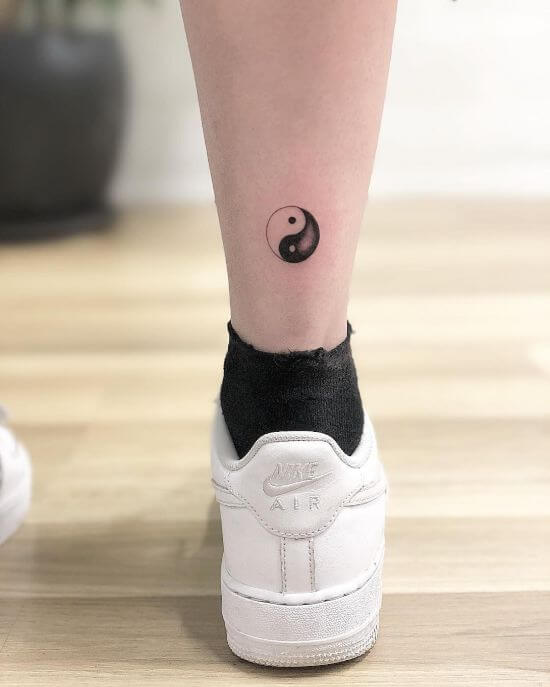 Small Yin Yang Women Leg Tattoo