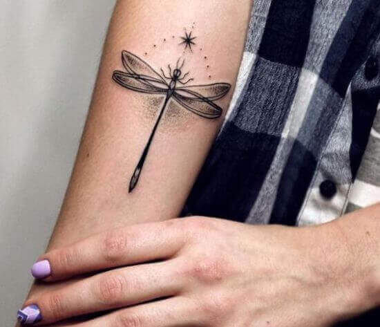 forearm dragonflies tattoo