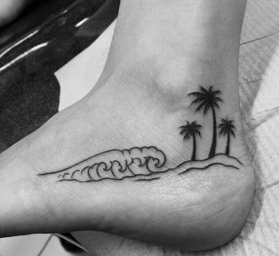 Best Palm tree tattoo designs with wave on foot