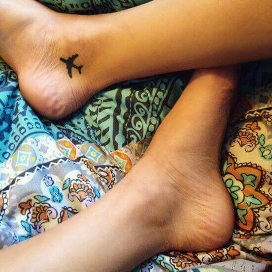 Cute and simple Plane tattoo for girl