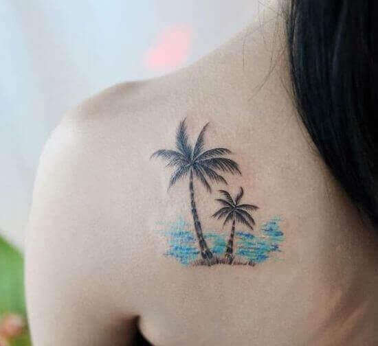 Shoulder palm tree inked girl