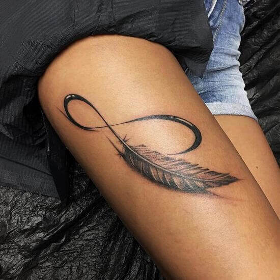 Infinity Tattoo with Feather on thigh