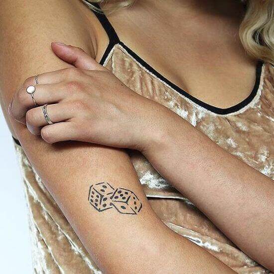 Dice tattoo designs on arm