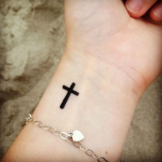 Cross Wrist tattoo girl