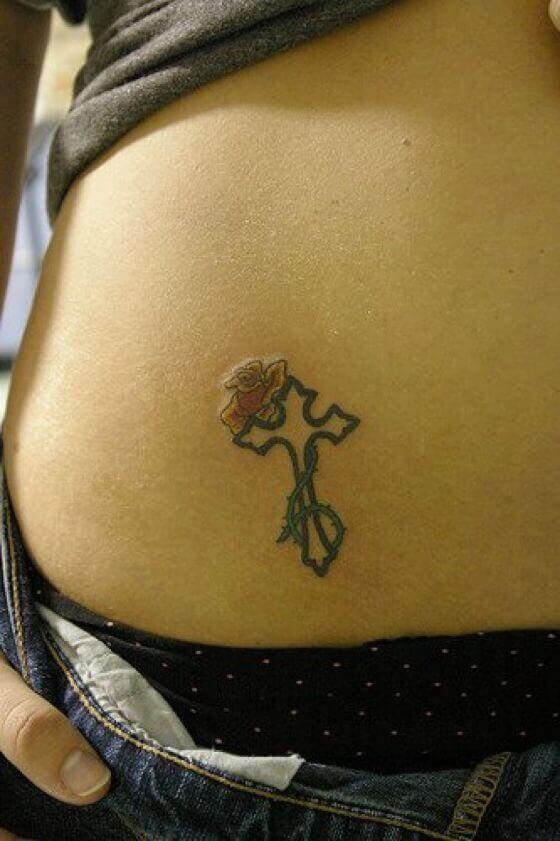 Small Christian Cross Tattoo girl with Rose