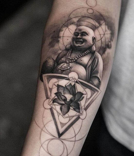 Smiling Buddha with lotus tattoo