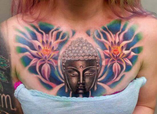 Tattoo of Buddha on girl's chest