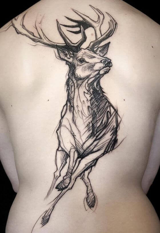 Stag tattoo on women back
