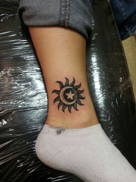 Sun and moon tattoo on the ankle