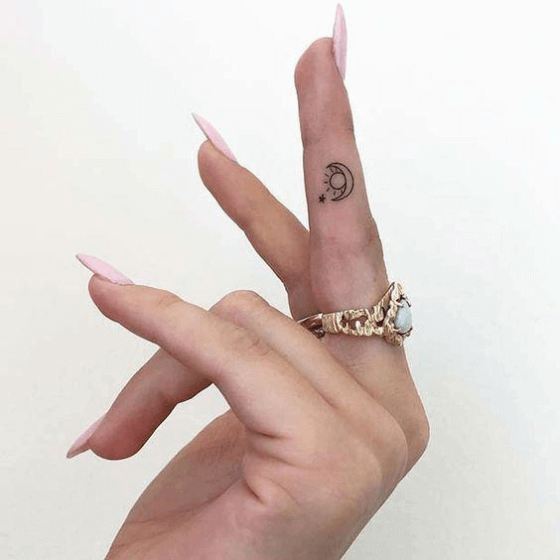 Tiny finger tattoo