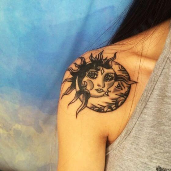 sun and moon tattoo ink on Girl shoulder