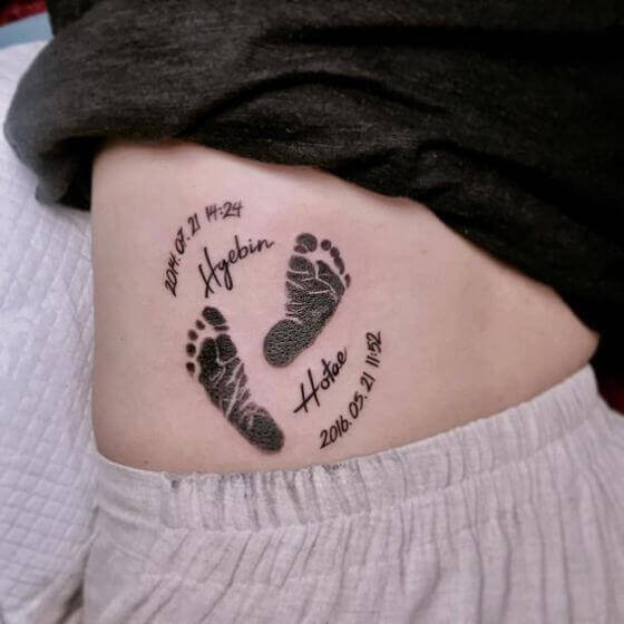 Baby feet Tattoo designs on tummy (1)