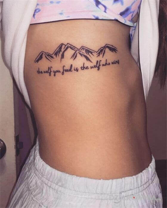 Mountain with Words on girl stomach