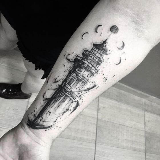 Best lighthouse tattoo on arm