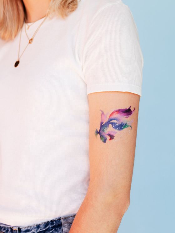 Betta Fish on girl arm