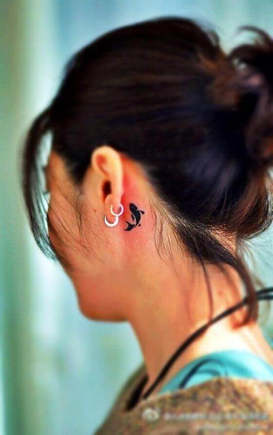 Cute Black Fish Tattoo designs Behind the Ear