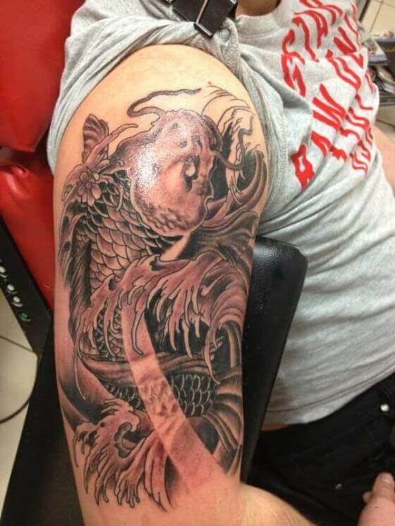 Japanese Fish Tattooing on man shoulder