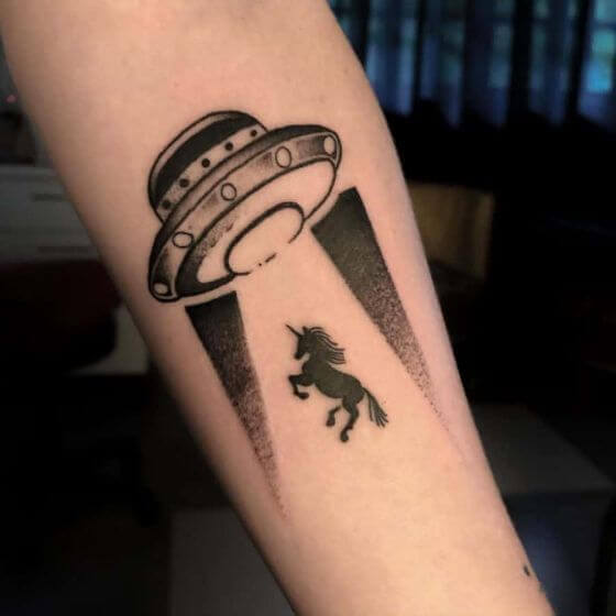 black silhouette beamed up by-spaceship-funny-unicorn-tattoo