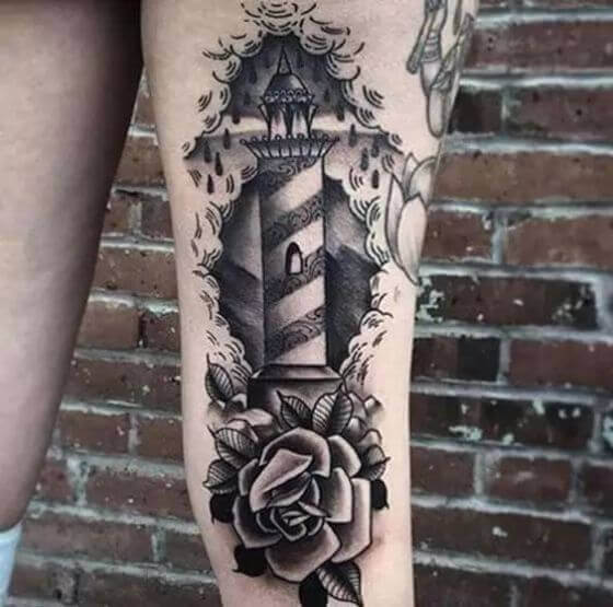 lighthouse tattoo with flowers