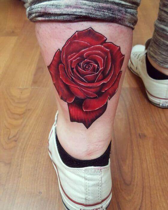 rose tattoo on leg