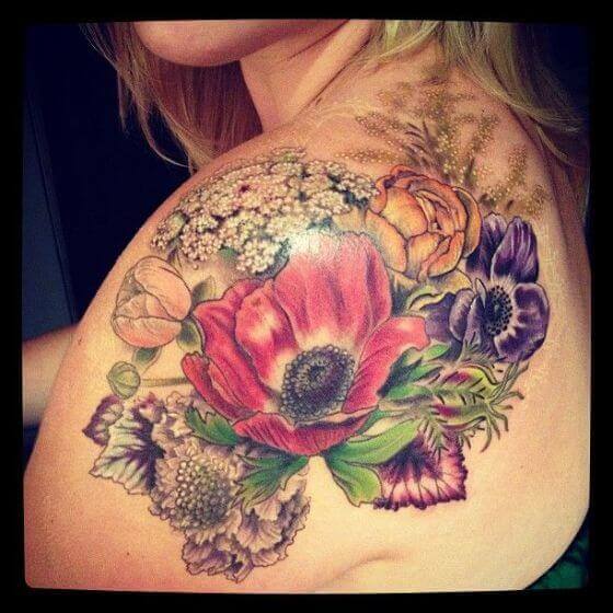 Colorful Flowers tattoo on girl shoulder