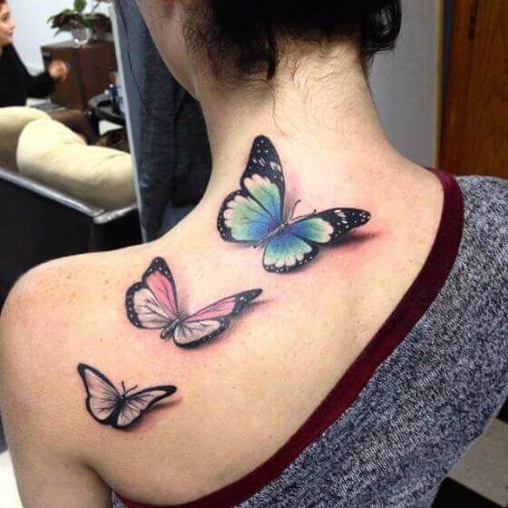 Three Butterflies shoulder tattoo female