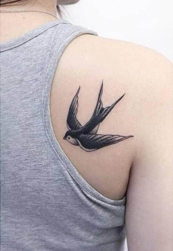 Uncaged Bird shoulder tattoo