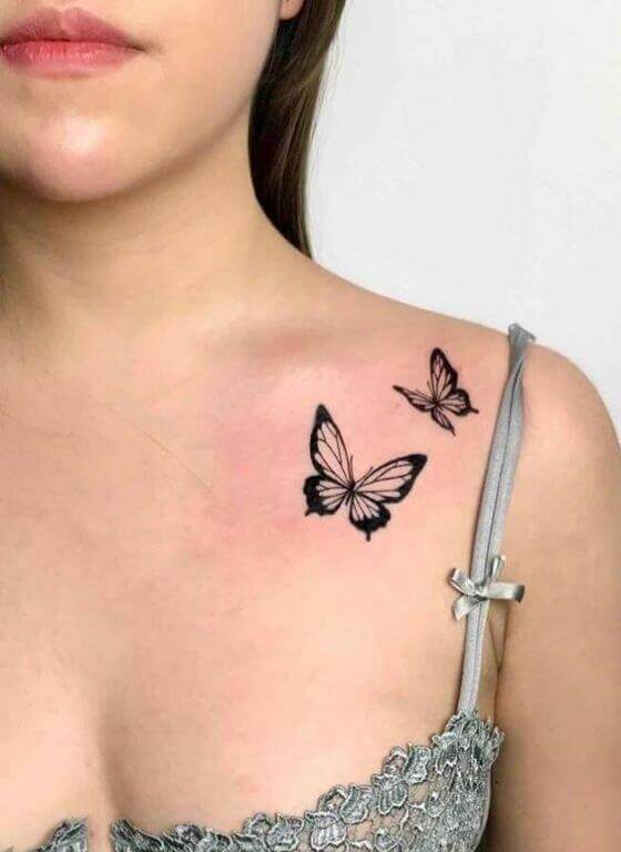 female butterfly tattoo on shoulder