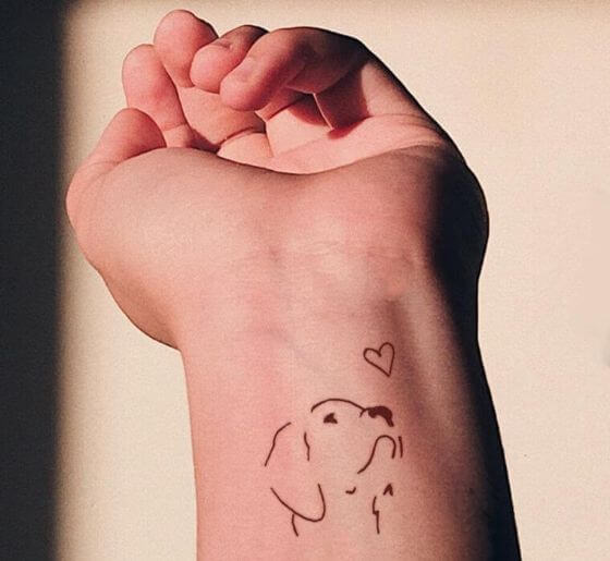 Dog Outline Tattoo designs on wrist