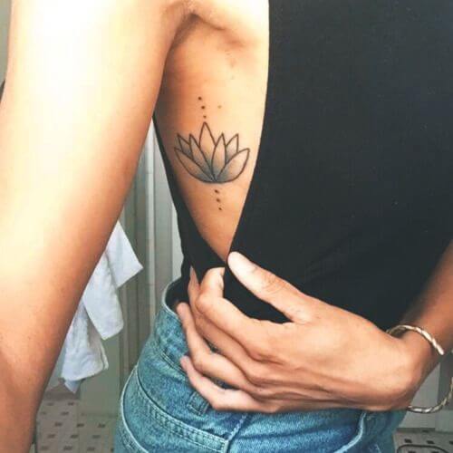 Rib Lotus Flower Tattoo