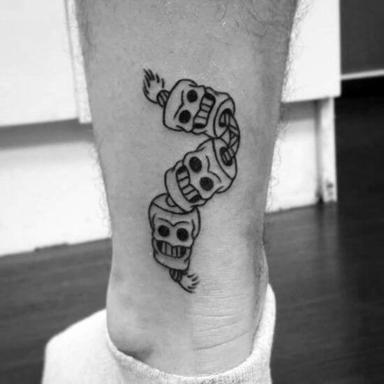 Small Masculine tattoo on ankle