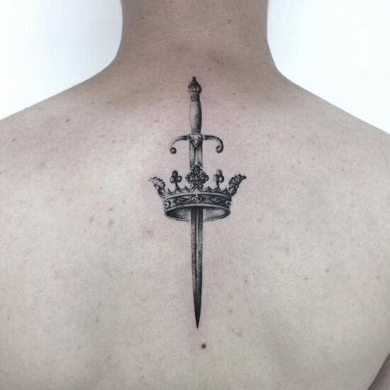 Small Sword Crown tattoo on back