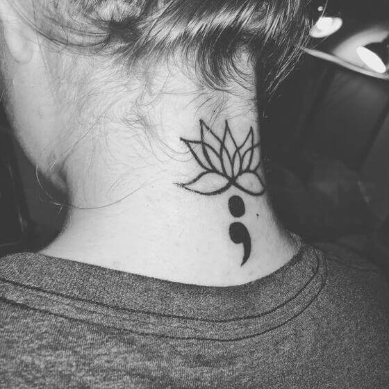 Lotus flower tattoo with semi colon on neck
