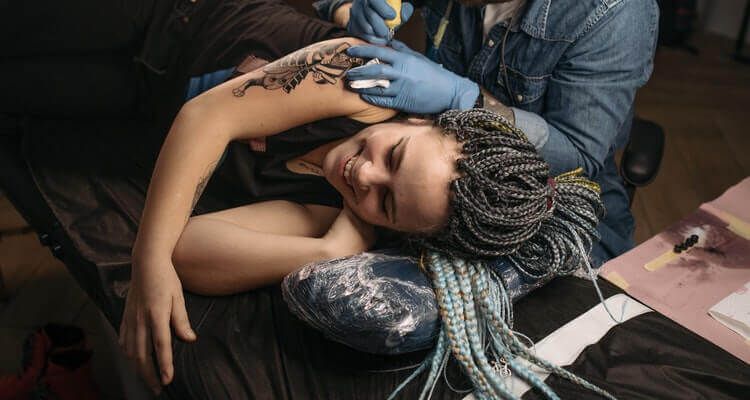 girl getting a tattoo