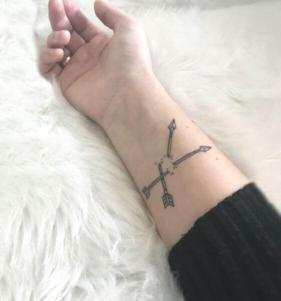 Arrow tattoo on forearm