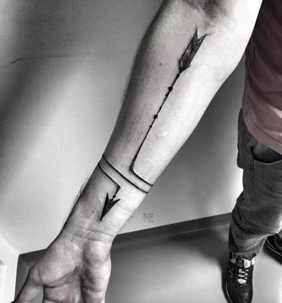 Arrow tattoo on forearm
